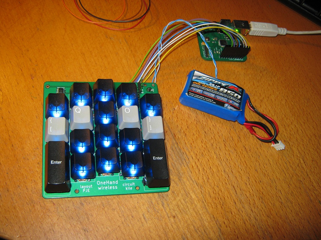 board connected to the programmer and the battery which powers the LEDs