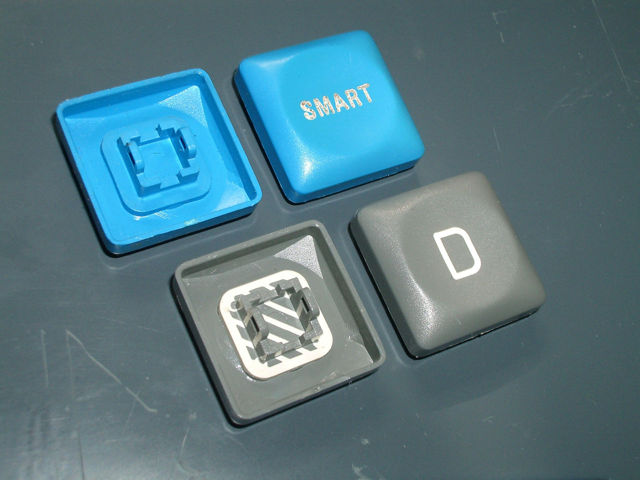 RAFI keycaps -- engraved vs double-shot.jpg