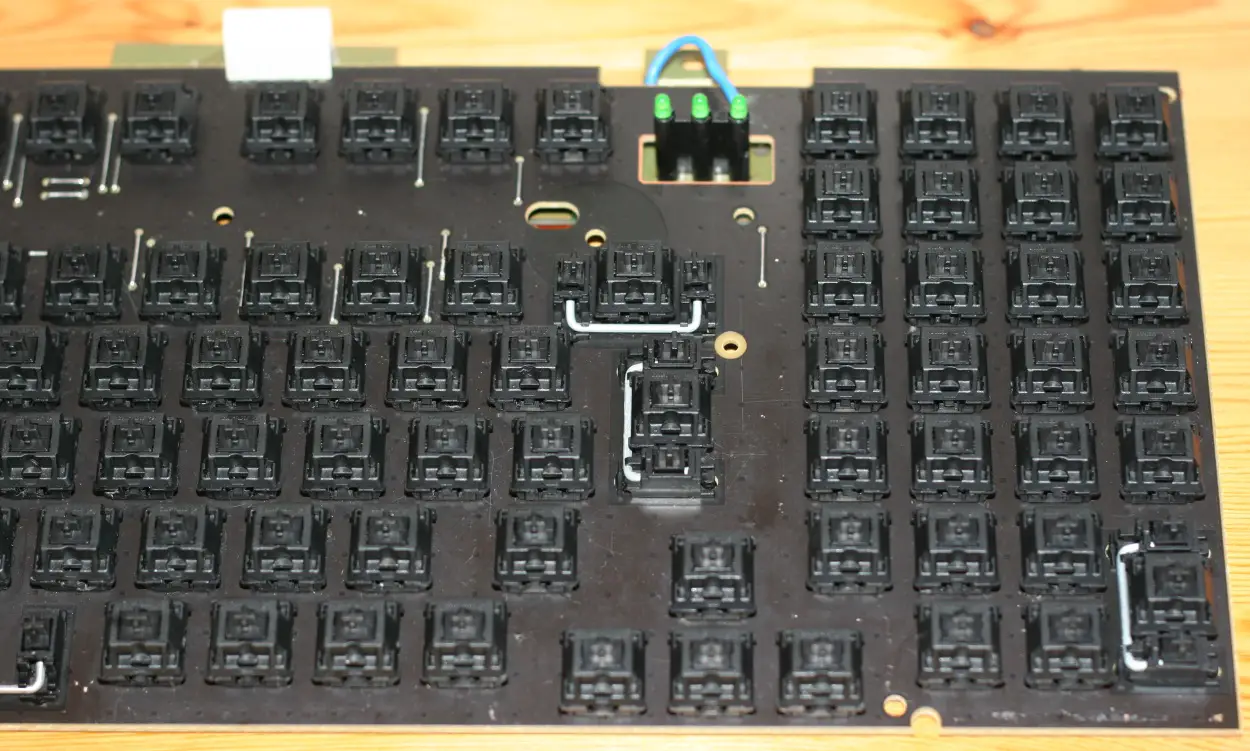 A picture of the right side of the PCB after steam cleaning. The things that look like scratches (amongst the switches) are &quot;residues&quot; of the hairs that didn't come off, because of the steam cleaning, since they somehow sticked to the switches as they were wrapped around them. I removed these with a paintbrush, tweezers and a vacuum cleaner after the PCB was completely dry. These &quot;residues&quot; could probably have been removed very easily by wiping (so no damage to the PCB whatsoever), but I was too lazy to do so.