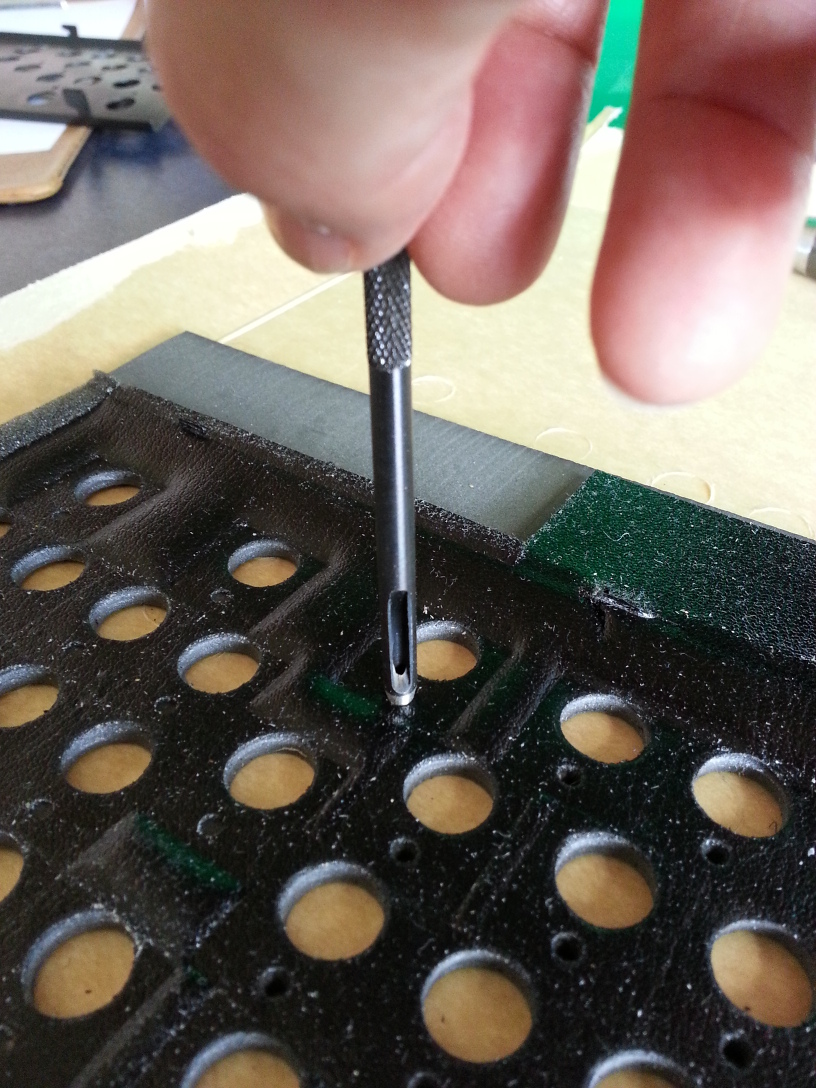 Cutting the 2mm (1/16 inch) holes