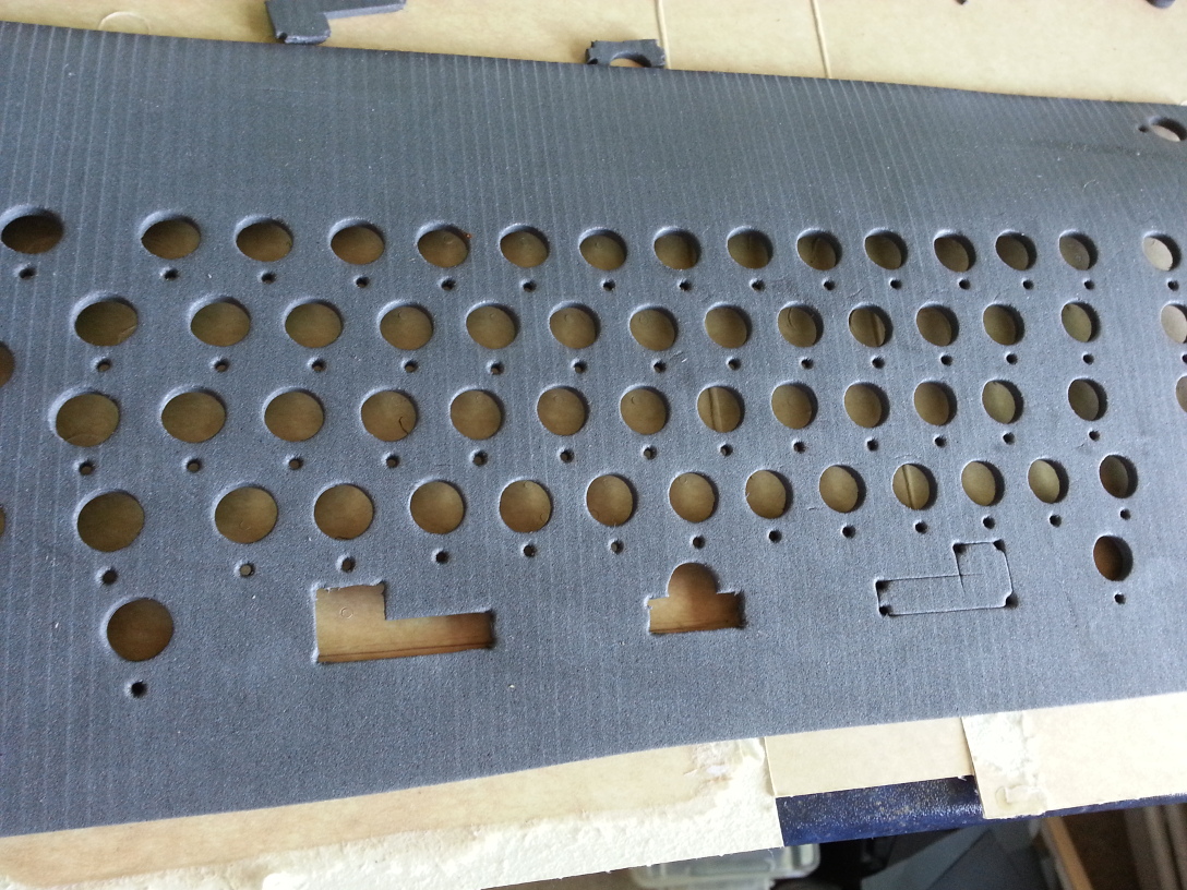 Holes for the space-bar assembly