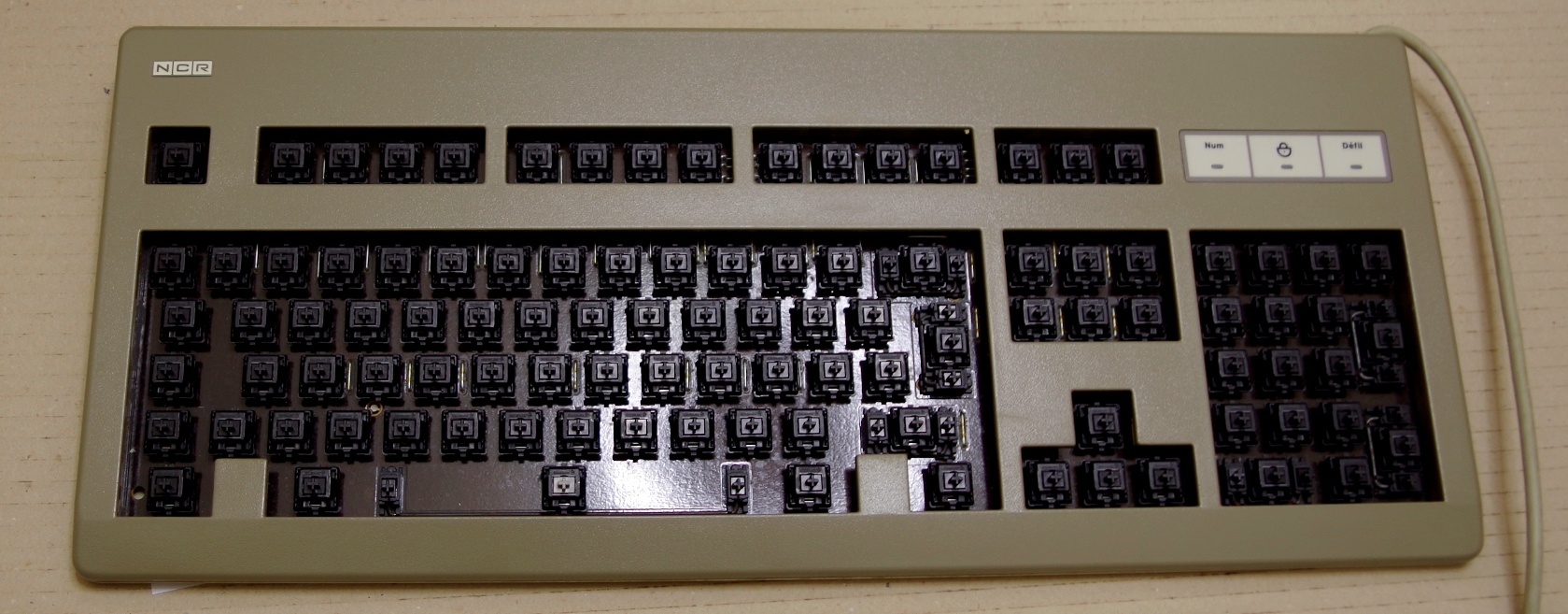 MX inner assembly fitted into the case of a NCR G81-3077 SAF