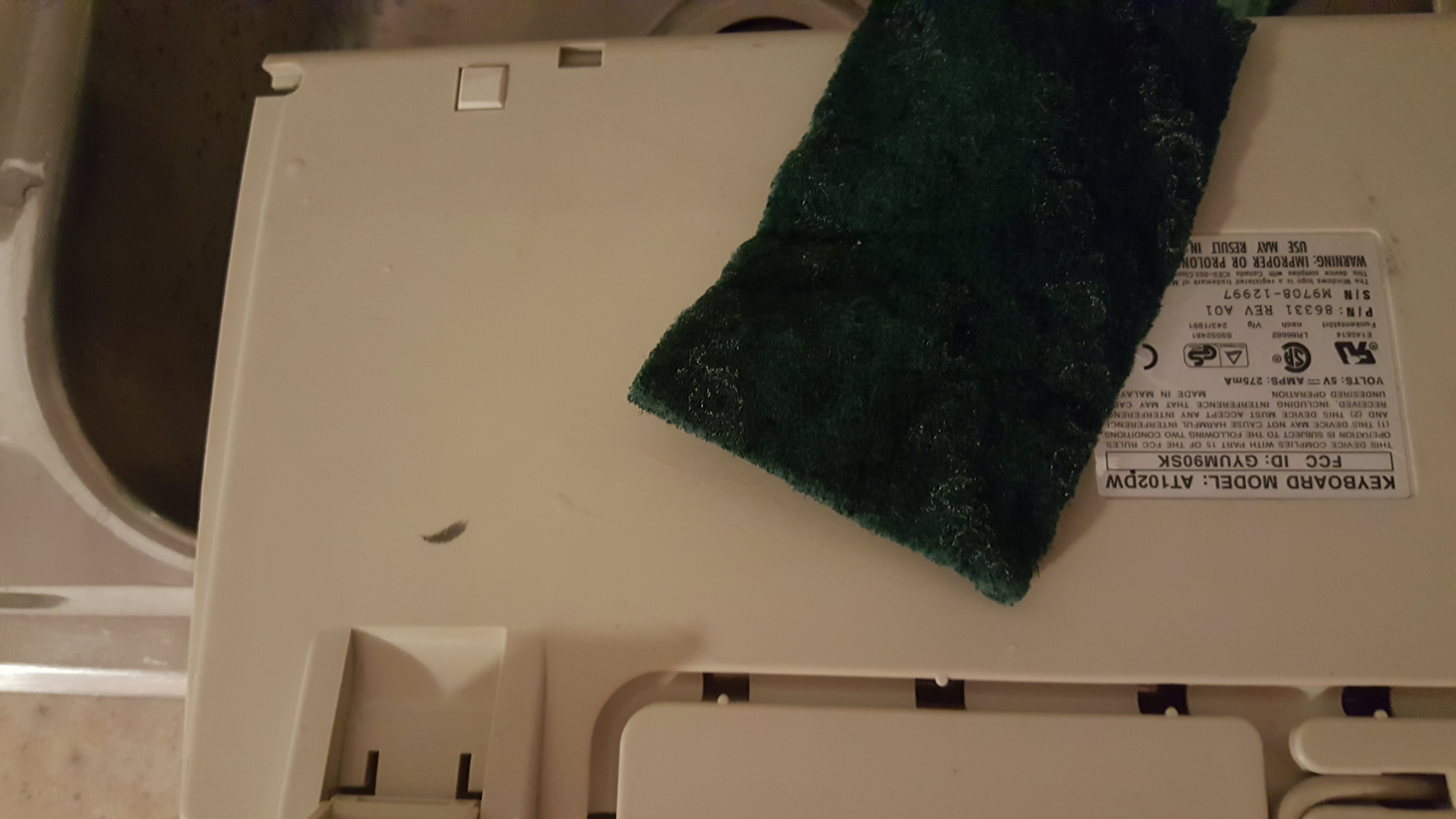 The miracle cloth - Scotch Brite scouring pad. Just be careful - it is basically like using fine grit sandpaper...so don't use it on painted cases or anything that's not already dull. Works great on these plain beige cases though! I also used it to remove all the shine from the ABS spacebar :)