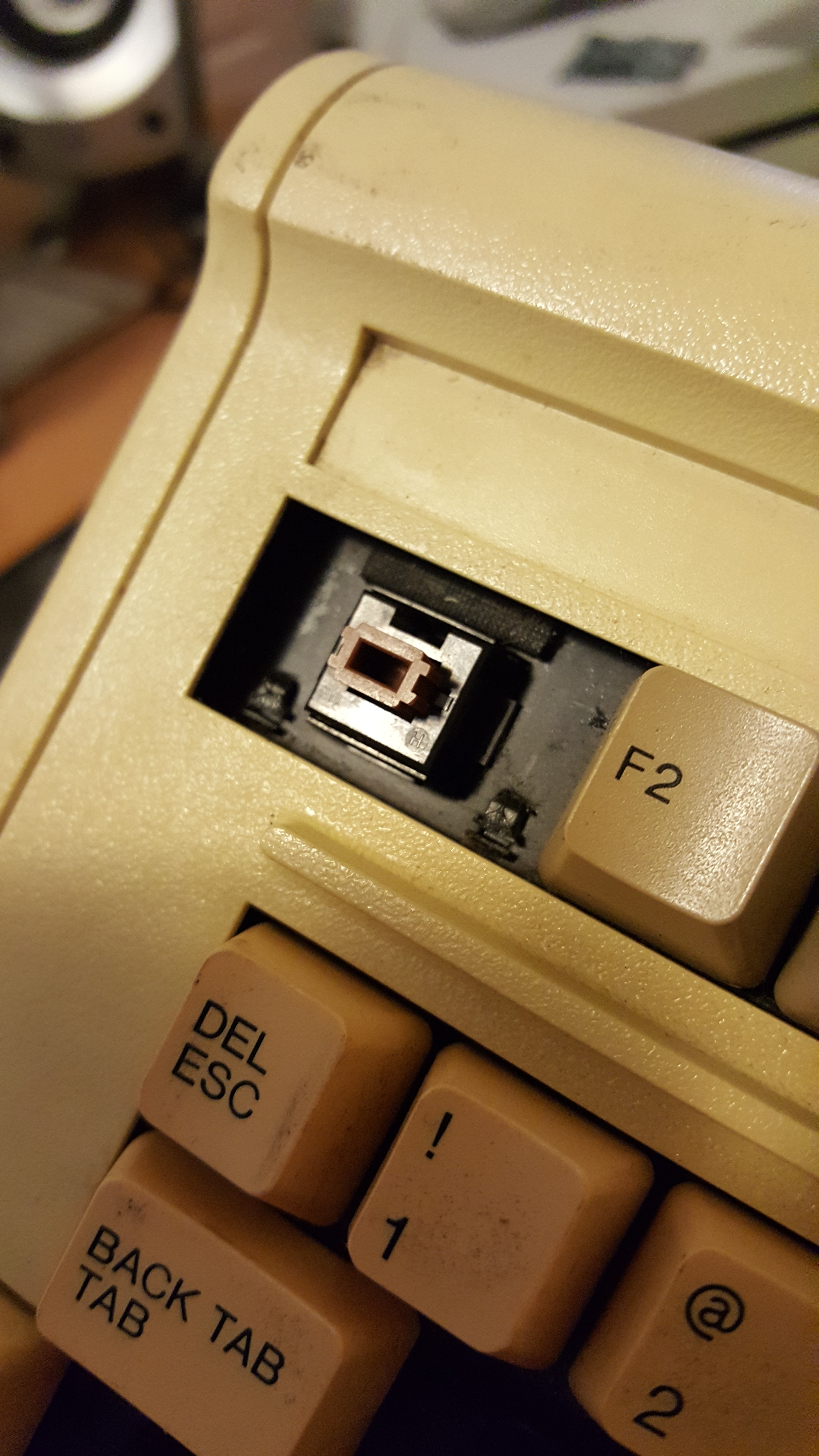 The little rubber bumpers to quieten the down stroke are a nice touch, but for some reason there's only a strip under the F keys and not the alphas or other keys. Really strange, stabilized F1 key btw - never seen this before.