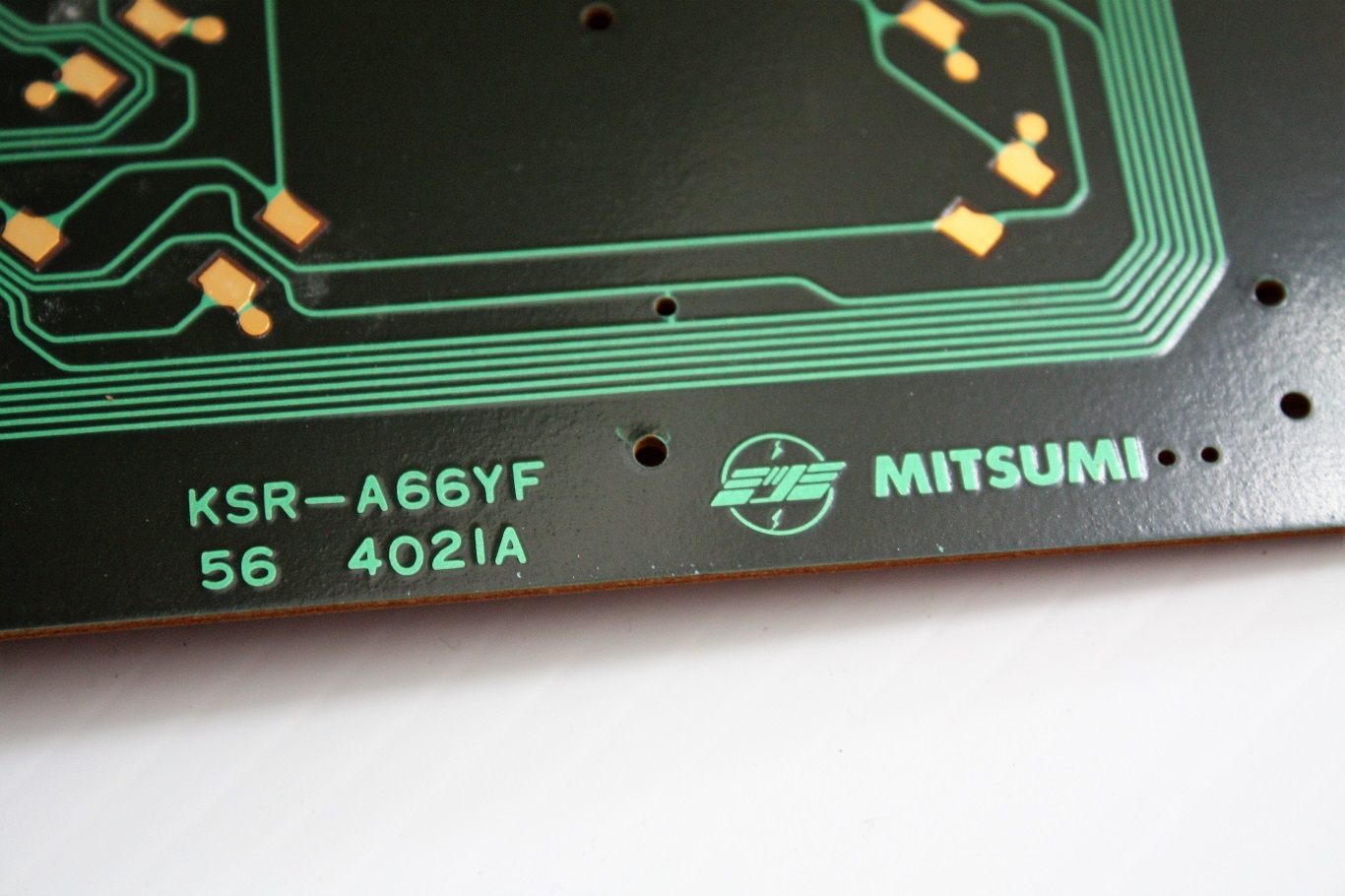 Educator 64 - Mitsumi KSR-A66YF keyboard PCB markings