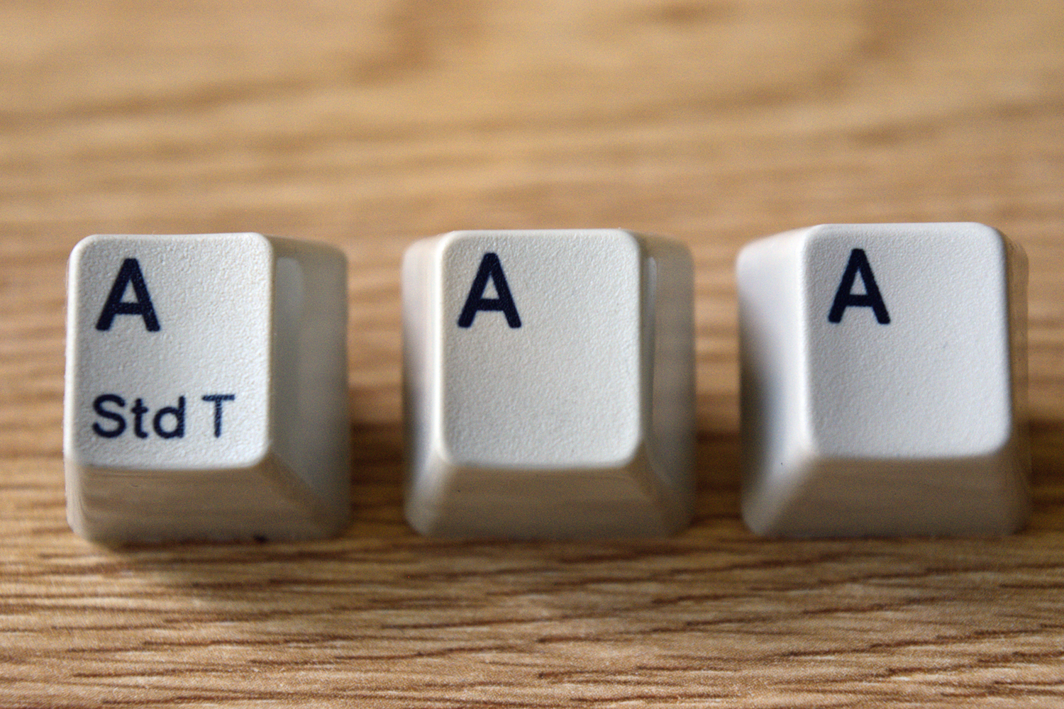 IBM 95 -- Comparison of A key (left to right): IBM 95, IBM Model M 1390120, Custom Unicomp SSK keyset