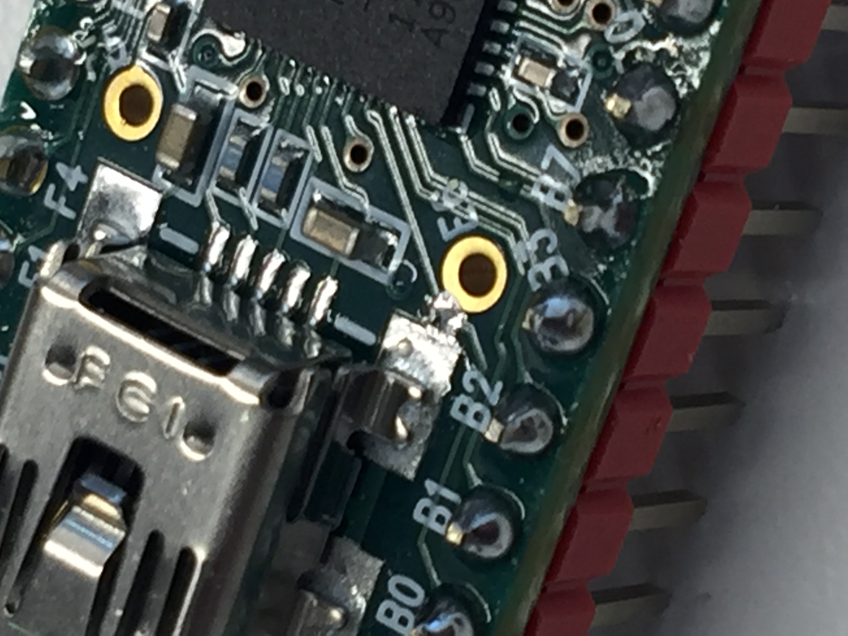A tiny drop of solder on the Teensy. This is because of my very bad skills with soldering.