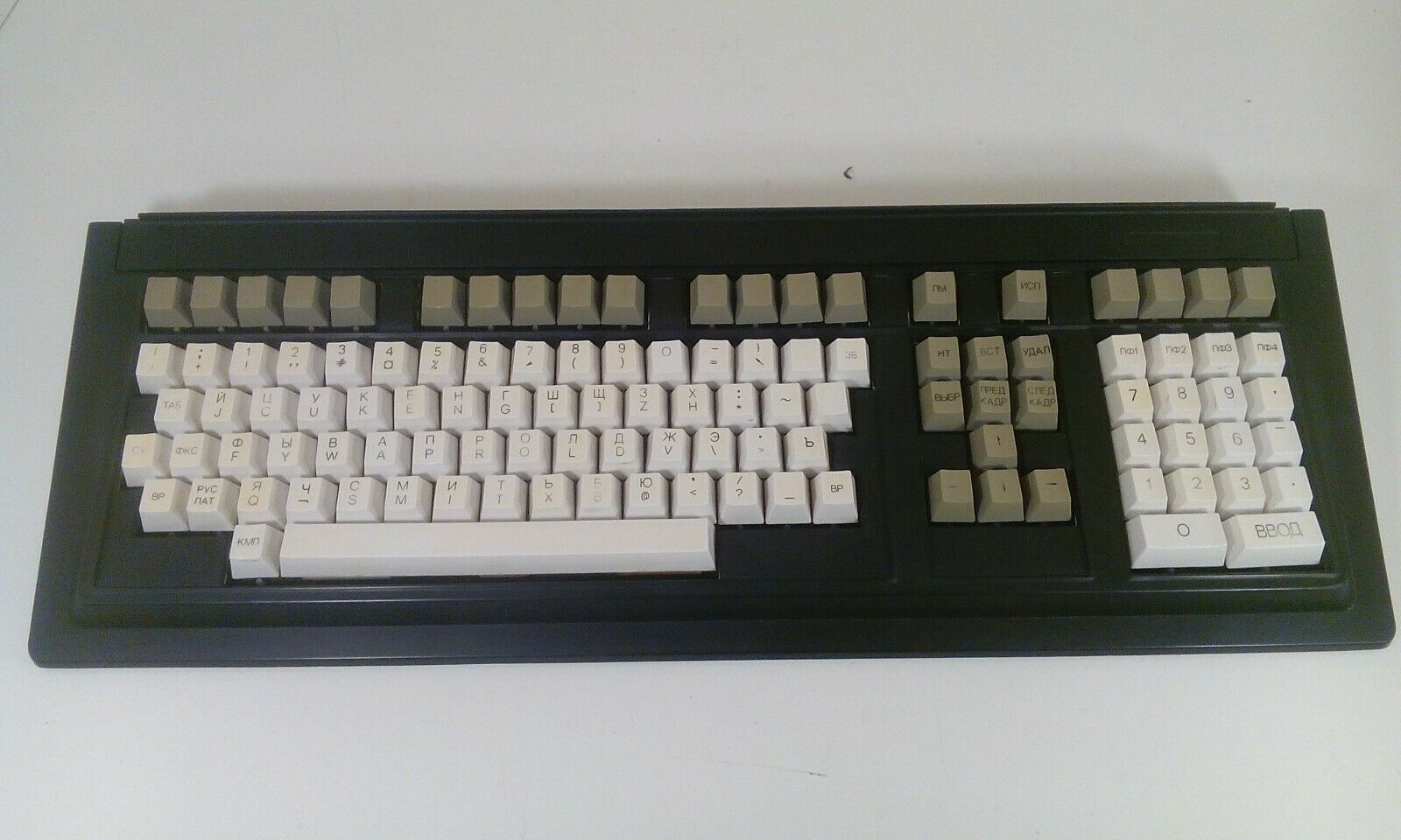 Printed keycaps that yellow over time.