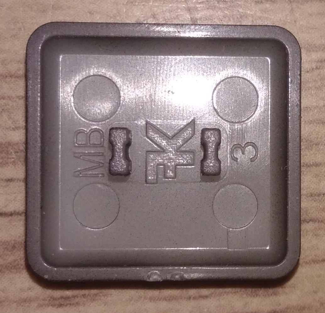 Backside of a keycap.