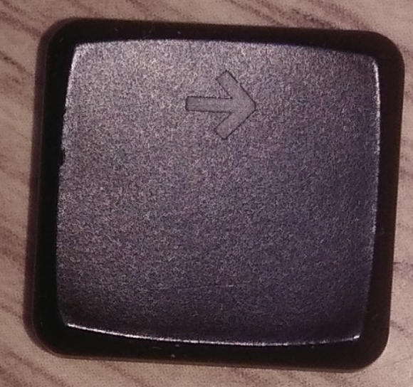 Right cursor keycap, frontside.