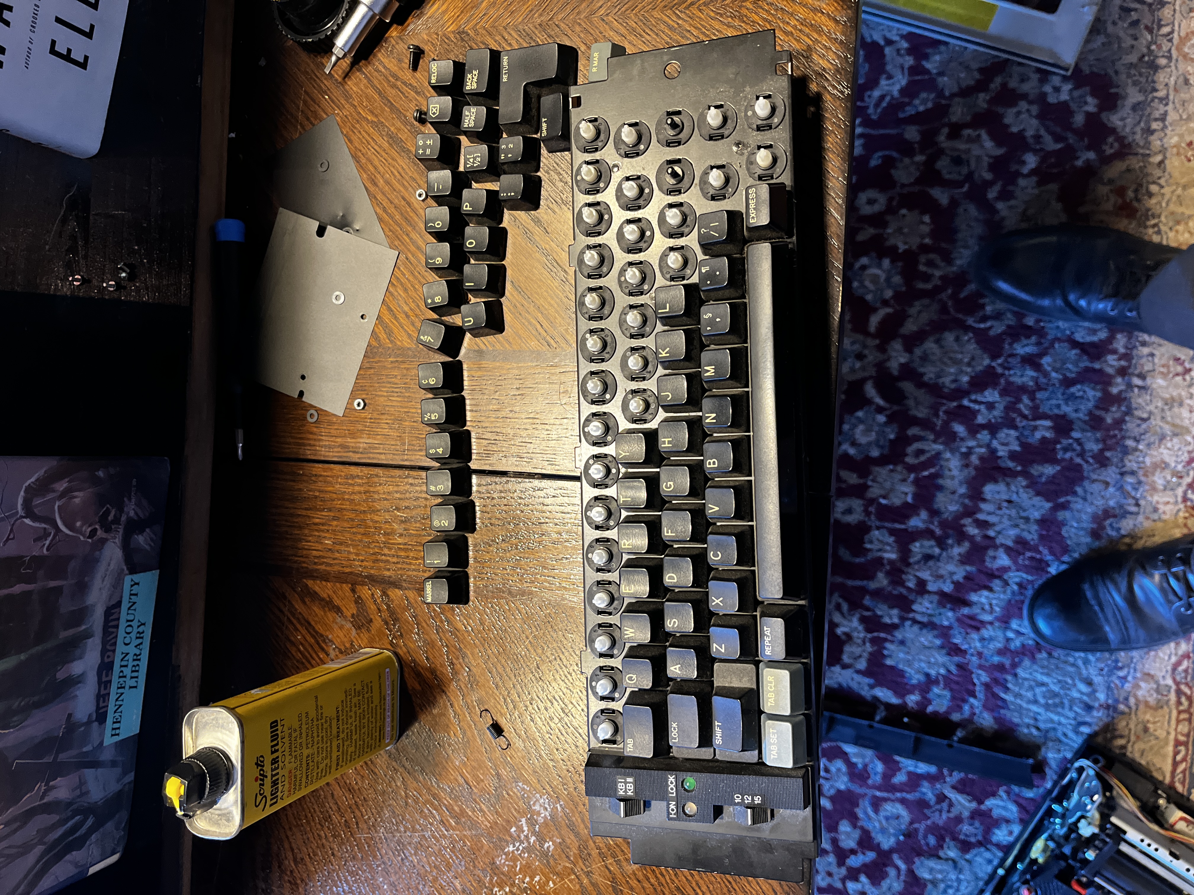 Keyboard removed (along with the rear control board). Some of the keycaps removed as well.